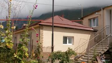 Фото номера Двухместный номер с 2 отдельными кроватями и ванной Гостевой дом Mount Guest г. Степанцминда 18