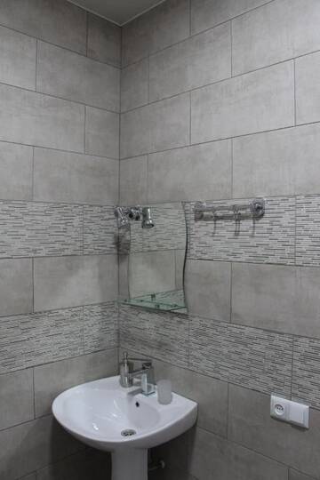 Фото номера Трехместный номер с видом на горы Мини-отель Hotel Elegant г. Степанцминда 14
