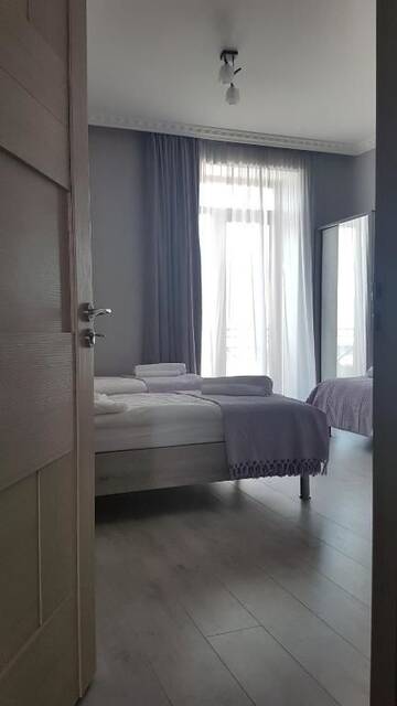 Фото номера Трехместный номер с видом на горы Мини-отель Hotel Elegant г. Степанцминда 17
