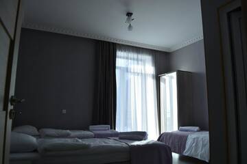 Фото номера Трехместный номер с видом на горы Мини-отель Hotel Elegant г. Степанцминда 21