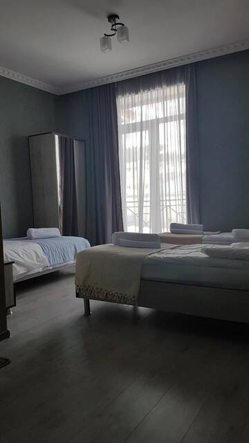 Фото номера Трехместный номер Мини-отель Hotel Elegant г. Степанцминда 7