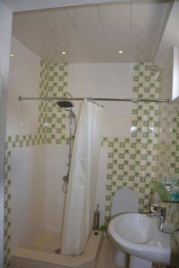 Фото номера Трехместный номер с ванной Гостевой дом Guest House Kavtarashvili 38 г. Степанцминда 6