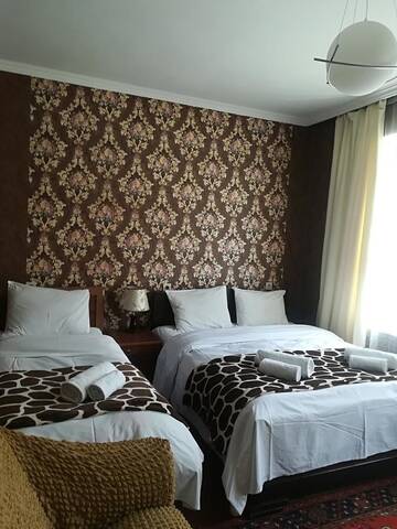 Фото номера Трехместный номер Гостевой дом Nikoloz Guesthouse г. Степанцминда 4