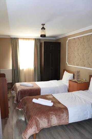 Фото номера Двухместный номер с 1 кроватью и видом на горы Гостевой дом Keti Ciklauri Guest House г. Степанцминда 14