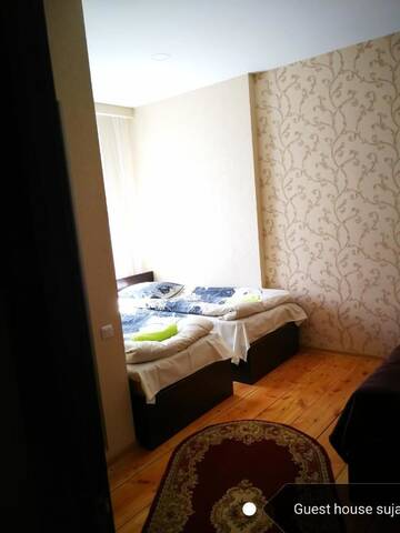 Фото номера Трехместный номер «Комфорт» с душем Гостевой дом Guesthouse Suja г. Степанцминда 5
