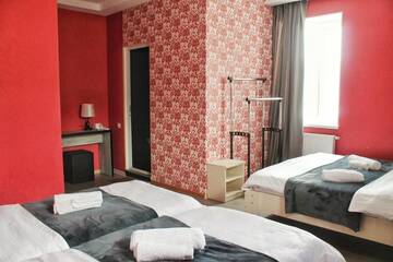 Фото номера Семейный номер Отель Hotel NOA Kazbegi г. Степанцминда 5