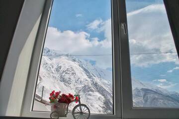 Фото номера Четырехместный номер Отель Hotel NOA Kazbegi г. Степанцминда 6
