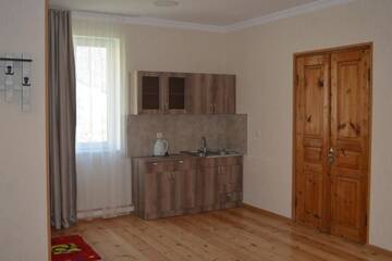 Фото номера Twin Room with Mountain View with Veranda Проживание в семье Ekaterine Guest House г. Степанцминда 35