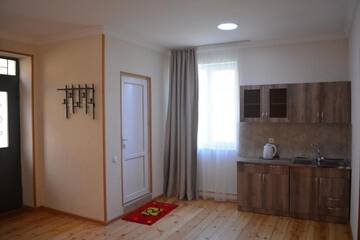 Фото номера Twin Room with Mountain View with Veranda Проживание в семье Ekaterine Guest House г. Степанцминда 39