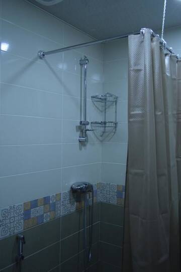 Фото номера Четырехместный номер с собственной ванной комнатой Гостевой дом Garbani Gardens г. Степанцминда 3