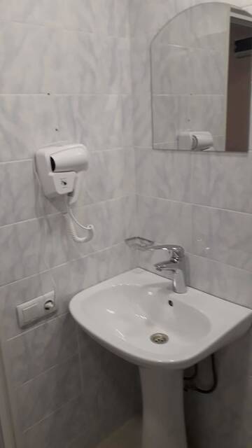 Фото номера Двухместный номер с 2 отдельными кроватями и общей ванной комнатой Гостевой дом II Floor г. Степанцминда 9