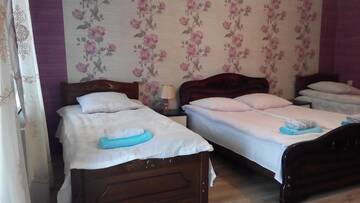 Фото номера Классический четырехместный номер Гостевой дом Guest House Temur Sujashvili г. Степанцминда 17