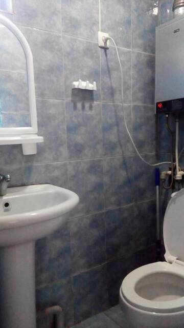 Фото номера Трехместный номер с общей ванной комнатой Гостевой дом Guest House Temur Sujashvili г. Степанцминда 3