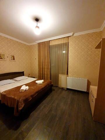 Фото номера Двухместный номер с 1 кроватью и видом на горы Мини-отель Nikolo Inn г. Степанцминда 3