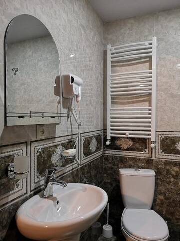 Фото номера Четырехместный номер с видом на горы Мини-отель Nikolo Inn г. Степанцминда 7