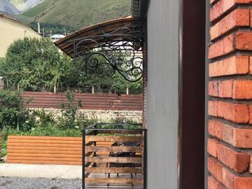 Фото номера Двухместный номер с 1 кроватью и видом на горы Отель Paradise Kazbegi г. Степанцминда 14