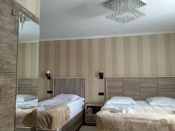 Фото номера Трехместный номер с собственной ванной комнатой Гостевой дом COZY HOUSE г. Степанцминда 21