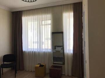Фото номера Двухместный номер с 1 кроватью и видом на горы Гостевой дом White Inn г. Степанцминда 4