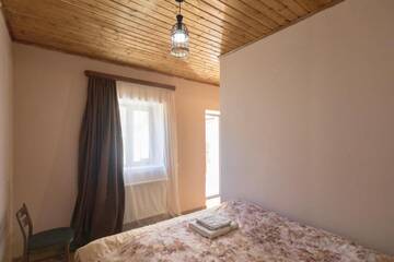 Фото номера Семейный номер с ванной комнатой Гостевой дом Guesthouse Nicolo г. Степанцминда 8