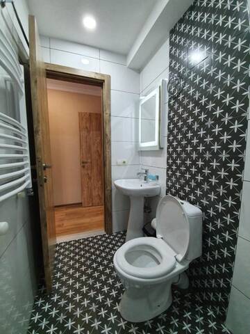 Фото номера Стандартный семейный номер Отель Hotel Gold Kazbegi г. Степанцминда 4